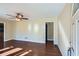 Bright living room featuring hardwood floors, a ceiling fan, and neutral wall colors at 1276 Clay Sw Rd, Mableton, GA 30126