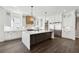 Gourmet kitchen boasts an expansive island, stainless appliances, and custom cabinetry at 262 Green Hill Ne Rd, Sandy Springs, GA 30342