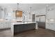 Elegant kitchen with a spacious island, wooden accents and stainless steel refrigerator at 262 Green Hill Ne Rd, Sandy Springs, GA 30342