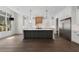 Beautiful gourmet kitchen with large island, stainless steel fridge, and custom cabinetry at 262 Green Hill Ne Rd, Sandy Springs, GA 30342