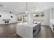 Bright open floor plan with a large island separating the kitchen from the living room at 262 Green Hill Ne Rd, Sandy Springs, GA 30342