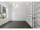 Bright office with a large window, dark hardwood floors, and built-in shelves at 262 Green Hill Ne Rd, Sandy Springs, GA 30342
