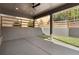 Covered patio with concrete flooring, ceiling fan, and a view of the backyard at 262 Green Hill Ne Rd, Sandy Springs, GA 30342