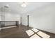Second floor loft space featuring wood floors and staircase at 262 Green Hill Ne Rd, Sandy Springs, GA 30342