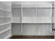 Close up of the custom shelving in the walk-in closet at 262 Green Hill Ne Rd, Sandy Springs, GA 30342