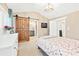 Bright bedroom with a sliding barn door, walk-in closet, and en-suite bathroom at 1262 Park Pass Row, Suwanee, GA 30024