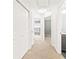 Hallway with access to bathroom, bedroom, and closet storage space at 1262 Park Pass Row, Suwanee, GA 30024