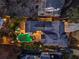 Aerial view showcasing a home with a lush backyard, including a uniquely shaped pool at 1352 Middlesex Ne Ave, Atlanta, GA 30306