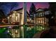 Luxurious backyard with a pool, in-pool seating and stone barbecue area, perfect for entertaining and relaxation at 1352 Middlesex Ne Ave, Atlanta, GA 30306