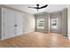 Bright bedroom with hardwood floors, large windows, and a spacious closet with double doors at 1352 Middlesex Ne Ave, Atlanta, GA 30306