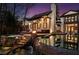 Beautiful backyard pool and spa, complete with a waterfall, stone accents and a deck overlooking the water at 1352 Middlesex Ne Ave, Atlanta, GA 30306