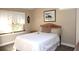 Cozy bedroom with natural light showcases a comfortable bed and serene decor at 4040 Merritt Dr, Cumming, GA 30041