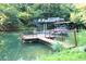 Dock with multiple levels for entertaining and relaxing by the lake at 4040 Merritt Dr, Cumming, GA 30041
