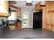 Modern kitchen featuring light-colored cabinets, granite countertops, and stainless steel appliances at 4040 Merritt Dr, Cumming, GA 30041