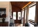Inviting sunroom with wood ceiling, a view to the outside, and a unique blend of indoor-outdoor living at 4040 Merritt Dr, Cumming, GA 30041