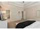 Spacious main bedroom with a neutral decor and an ensuite bathroom at 1283 Hada Ct, Lawrenceville, GA 30043