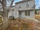 Backyard featuring lush grass and beautiful siding on a rainy day at 3153 Kingswood Gln, Decatur, GA 30034