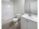 This bathroom features a shower and tub combo, toilet, and sink with vanity and mirror at 3153 Kingswood Gln, Decatur, GA 30034