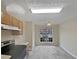 Kitchen featuring laminate floors and neutral paint with bright natural light at 3153 Kingswood Gln, Decatur, GA 30034