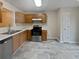 Well-lit kitchen featuring modern appliances and sleek countertops at 3153 Kingswood Gln, Decatur, GA 30034