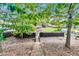 Overhead view of backyard featuring a walking path to a grassy area with playset and fire pit at 3580 S Sherwood Se Rd, Smyrna, GA 30082