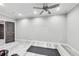 Home gym features a yoga mat, ceiling fan and lots of space at 3580 S Sherwood Se Rd, Smyrna, GA 30082