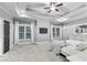 Relaxing main bedroom with soft carpet, black-out curtains, and a wall-mounted television at 3580 S Sherwood Se Rd, Smyrna, GA 30082