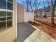 Back patio with a privacy fence at 11403 S Grove Dr, Hampton, GA 30228