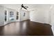 Large living room with a staircase and access to the outdoors at 11403 S Grove Dr, Hampton, GA 30228