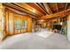 Unfinished basement with exposed framework, visible ductwork, and miscellaneous objects at 1416 Elgin Way, Cumming, GA 30041