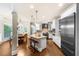 Spacious kitchen with stone countertops, stainless steel appliances and island at 1416 Elgin Way, Cumming, GA 30041