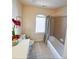 Bathroom with a walk-in shower, arched window, and decorative flower pot at 2371 Bellefonte Ave # 61, Lawrenceville, GA 30043