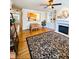 Cozy living room boasts hardwood floors, a fireplace, and large decorative rug at 2371 Bellefonte Ave # 61, Lawrenceville, GA 30043