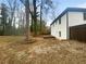 The backyard has rocks and exposed dirt, and a small deck at 2046 Dellwood Pl, Decatur, GA 30032