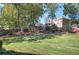 Backyard with a lawn and home in the background at 427 Picketts Lake Dr, Acworth, GA 30101