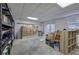 Unfinished basement featuring open space and shelved storage at 427 Picketts Lake Dr, Acworth, GA 30101