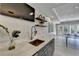 Contemporary bar area with a copper sink, mini fridge, and decor that complements the design at 4634 Meadow Bluff Ln, Suwanee, GA 30024