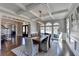 Elegant dining room featuring coffered ceilings, large windows, and an open layout at 4634 Meadow Bluff Ln, Suwanee, GA 30024