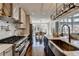 Stylish kitchen with marble countertops and gas range at 4634 Meadow Bluff Ln, Suwanee, GA 30024