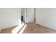 Bright bedroom with sleek hardwood flooring and a modern, minimalist design at 165 Cedarwood Ln, Roswell, GA 30075