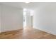Bright room with hardwood flooring, modern trim, light walls and plentiful natural light from the large windows at 165 Cedarwood Ln, Roswell, GA 30075