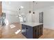 Stylish kitchen island with sleek countertop and natural light, perfect for entertaining guests at 165 Cedarwood Ln, Roswell, GA 30075