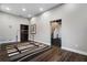 Spacious finished basement featuring hardwood floors, recessed lighting, and ample room for activities at 2447 Tift Nw Ct, Kennesaw, GA 30152