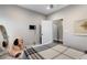 Cozy bedroom featuring neutral walls, carpet, and an open doorway at 2447 Tift Nw Ct, Kennesaw, GA 30152