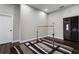 Versatile room with wood floors, ballet bar, and wine cabinet, perfect for fitness or entertainment at 2447 Tift Nw Ct, Kennesaw, GA 30152