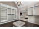 Open walk-in closet featuring a decorative chandelier and open shelving at 2447 Tift Nw Ct, Kennesaw, GA 30152