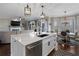 Beautiful kitchen featuring a large island with quartz countertops and stainless steel appliances at 2447 Tift Nw Ct, Kennesaw, GA 30152