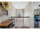 Upstairs landing with hardwood floors, natural light and view of the stairwell at 2447 Tift Nw Ct, Kennesaw, GA 30152