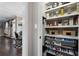 Well-organized pantry with shelving and storage bins to maximize space and convenience at 2447 Tift Nw Ct, Kennesaw, GA 30152