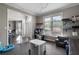 Inviting playroom featuring lots of space for activities and a view through to the kitchen at 2447 Tift Nw Ct, Kennesaw, GA 30152